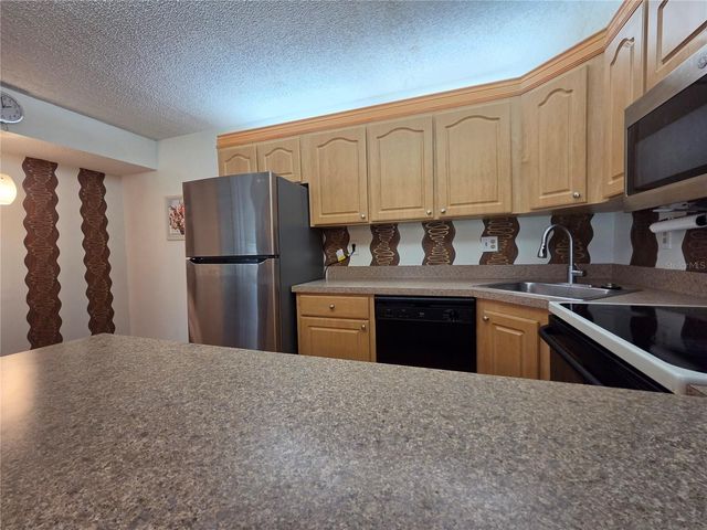 1700 PINE RIDGE WAY E C1, Palm Harbor, FL 34684