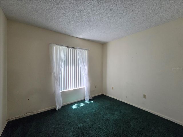 1700 PINE RIDGE WAY E C1, Palm Harbor, FL 34684