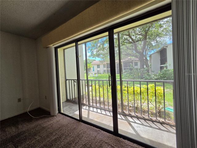 1700 PINE RIDGE WAY E C1, Palm Harbor, FL 34684