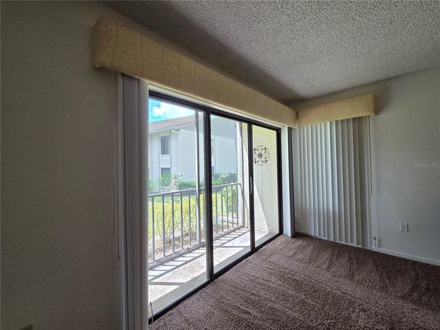 1700 PINE RIDGE WAY E C1, Palm Harbor, FL 34684