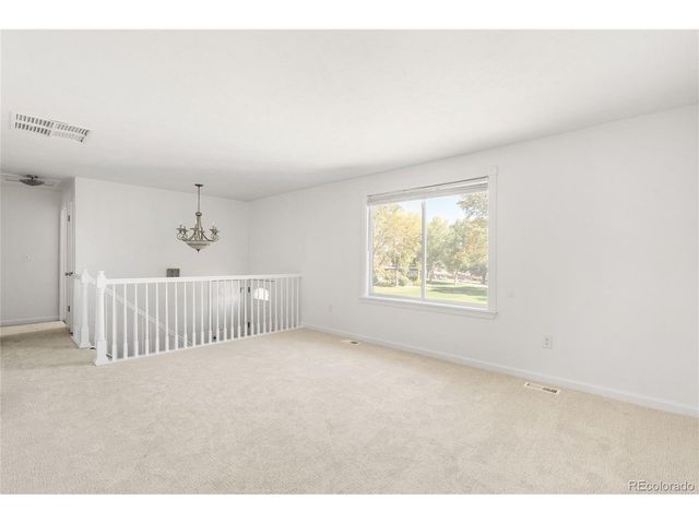 8261 W Pomona Dr, Arvada, CO 80005