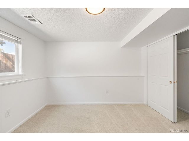 8261 W Pomona Dr, Arvada, CO 80005