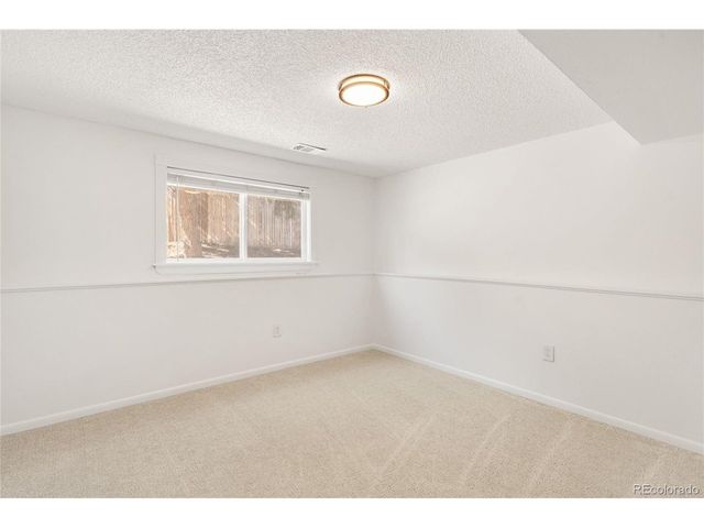 8261 W Pomona Dr, Arvada, CO 80005