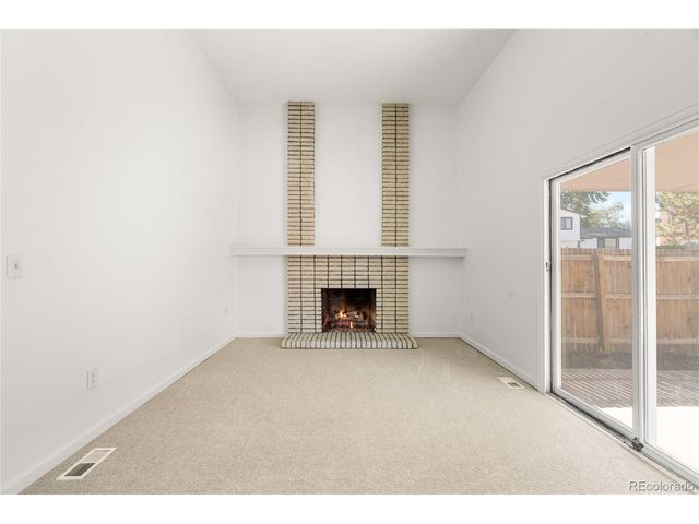 8261 W Pomona Dr, Arvada, CO 80005