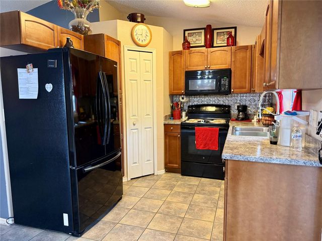 1414 SWAN COURT, Poinciana, FL 34759