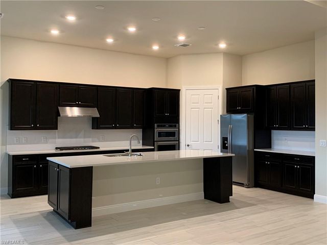 9108 Snowy Owl WAY, Naples, FL 34120