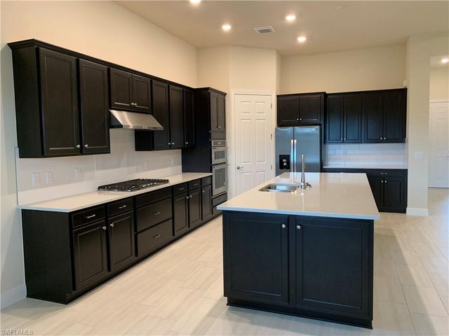 9108 Snowy Owl WAY, Naples, FL 34120