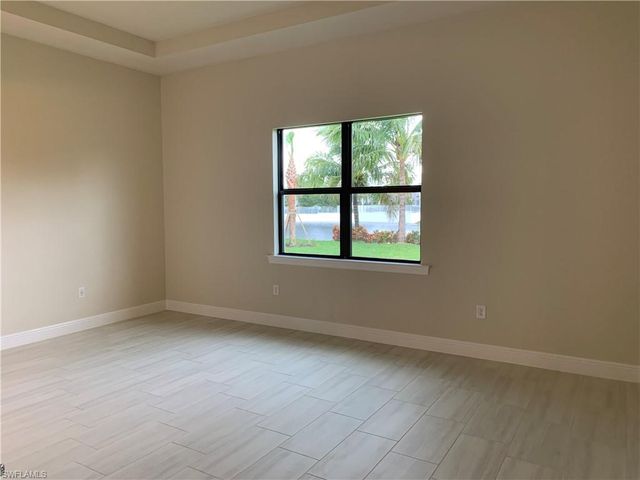 9108 Snowy Owl WAY, Naples, FL 34120
