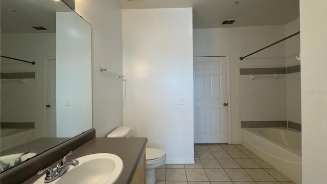 6413 ASTOR VILLAGE AVENUE 309, Orlando, FL 32835