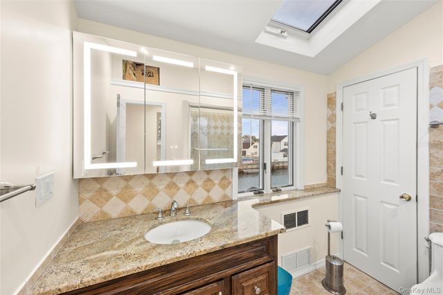 61 S Bay Avenue, Massapequa, NY 11758