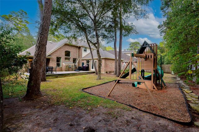 34 S Hawthorne Hollow Circle, The Woodlands, TX 77384