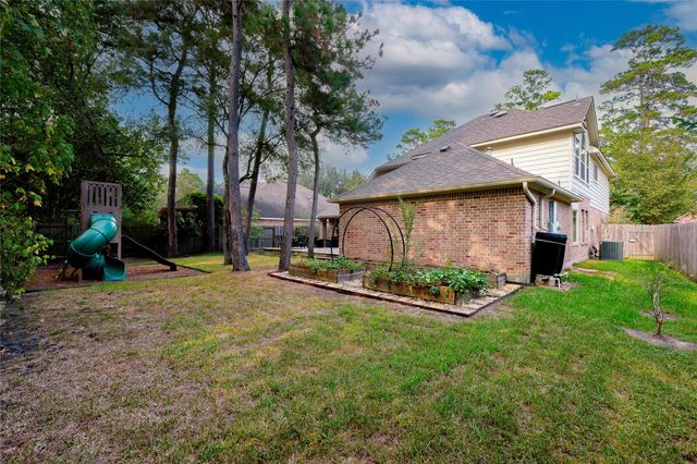 34 S Hawthorne Hollow Circle, The Woodlands, TX 77384