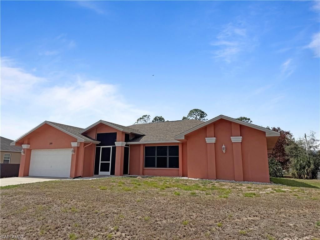 209 McArthur AVE, Lehigh Acres, FL 33936