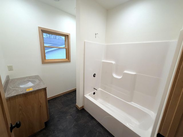 506 S 3rd St, Osage, IA 50461