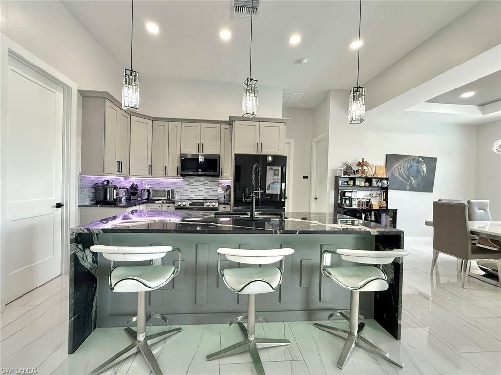 Image 8 of property listing at 2618 NW 8th TER, Cape Coral, FL 33993