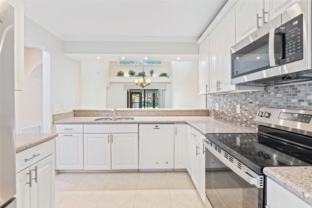 8230 AMBROSE COVE WAY, Orlando, FL 32819