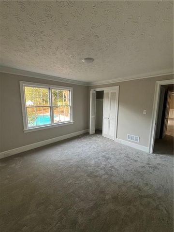 5033 Charlemagne SW Way, Lilburn, GA 30047