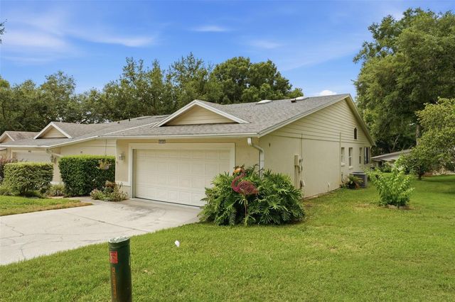 8928 VILLAGE GREEN BOULEVARD, Clermont, FL 34711