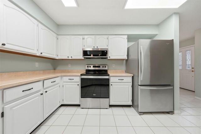 8928 VILLAGE GREEN BOULEVARD, Clermont, FL 34711