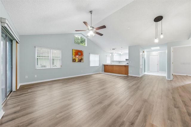 8928 VILLAGE GREEN BOULEVARD, Clermont, FL 34711