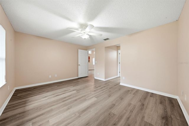 8928 VILLAGE GREEN BOULEVARD, Clermont, FL 34711