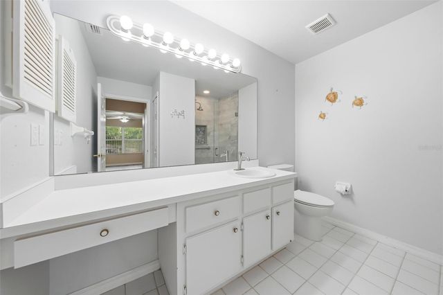 8928 VILLAGE GREEN BOULEVARD, Clermont, FL 34711