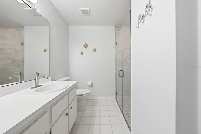 8928 VILLAGE GREEN BOULEVARD, Clermont, FL 34711