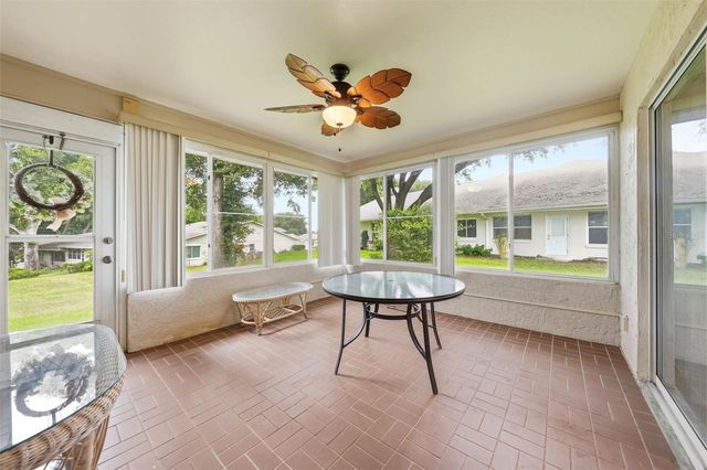 8928 VILLAGE GREEN BOULEVARD, Clermont, FL 34711