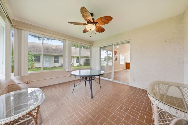 8928 VILLAGE GREEN BOULEVARD, Clermont, FL 34711