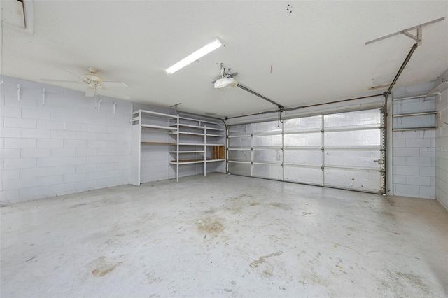 8928 VILLAGE GREEN BOULEVARD, Clermont, FL 34711