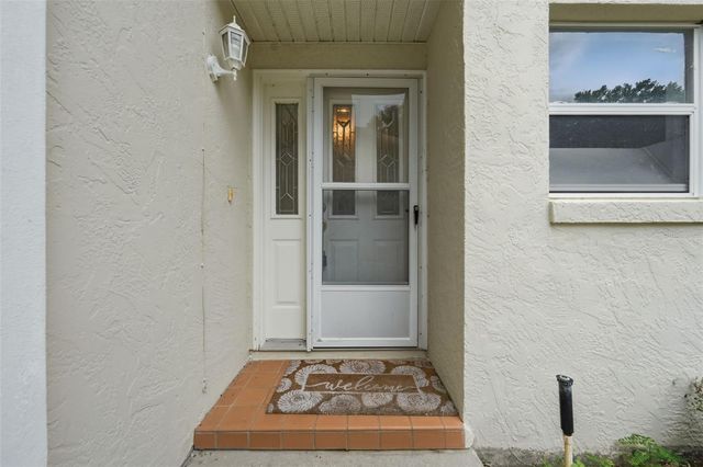 8928 VILLAGE GREEN BOULEVARD, Clermont, FL 34711