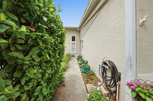8928 VILLAGE GREEN BOULEVARD, Clermont, FL 34711