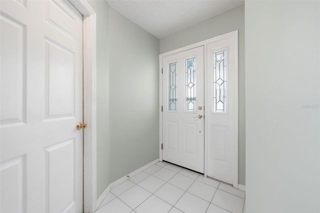 8928 VILLAGE GREEN BOULEVARD, Clermont, FL 34711