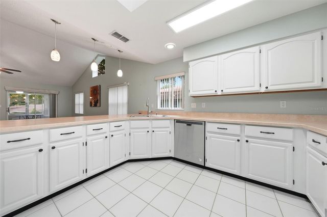 8928 VILLAGE GREEN BOULEVARD, Clermont, FL 34711