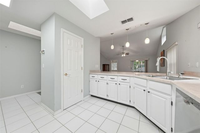 8928 VILLAGE GREEN BOULEVARD, Clermont, FL 34711