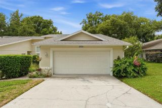 8928 VILLAGE GREEN BOULEVARD, Clermont, FL 34711