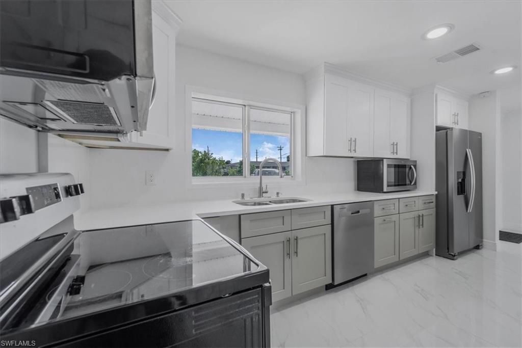 105 SE 45th TER, CAPE CORAL, FL 33904 — photo 2