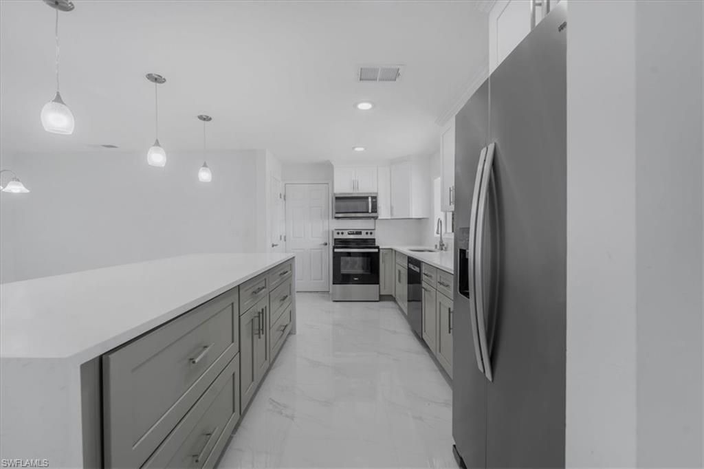 105 SE 45th TER, CAPE CORAL, FL 33904 — photo 4