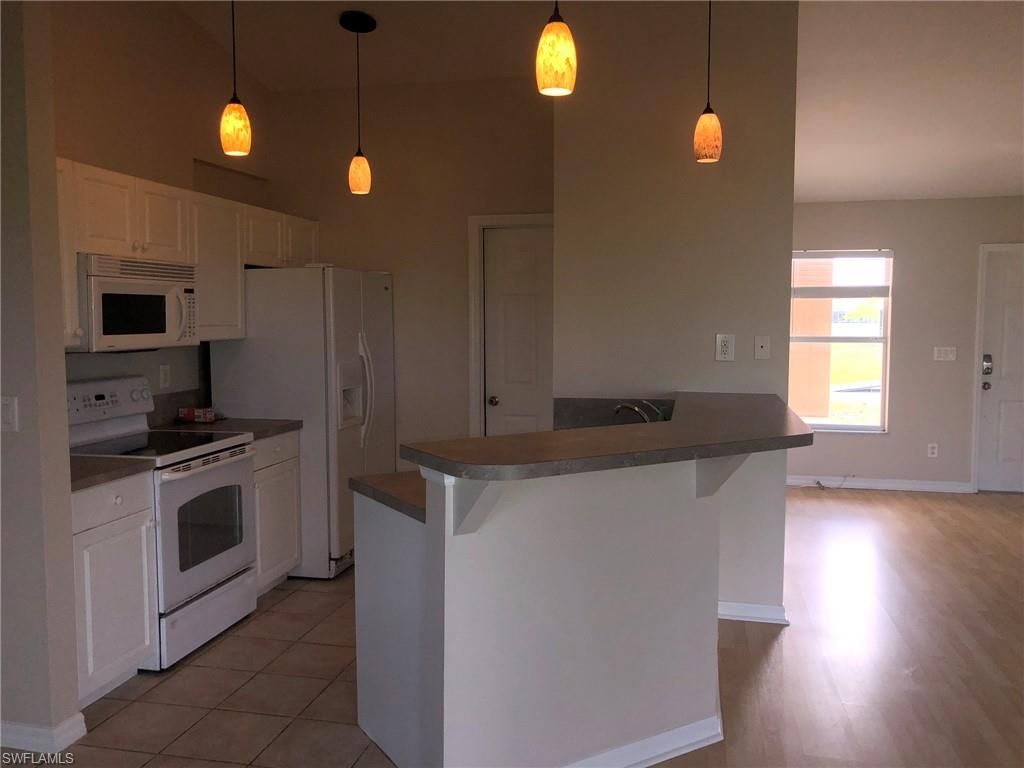 Image 10 of property listing at 1004 NW 7th AVE, Cape Coral, FL 33993