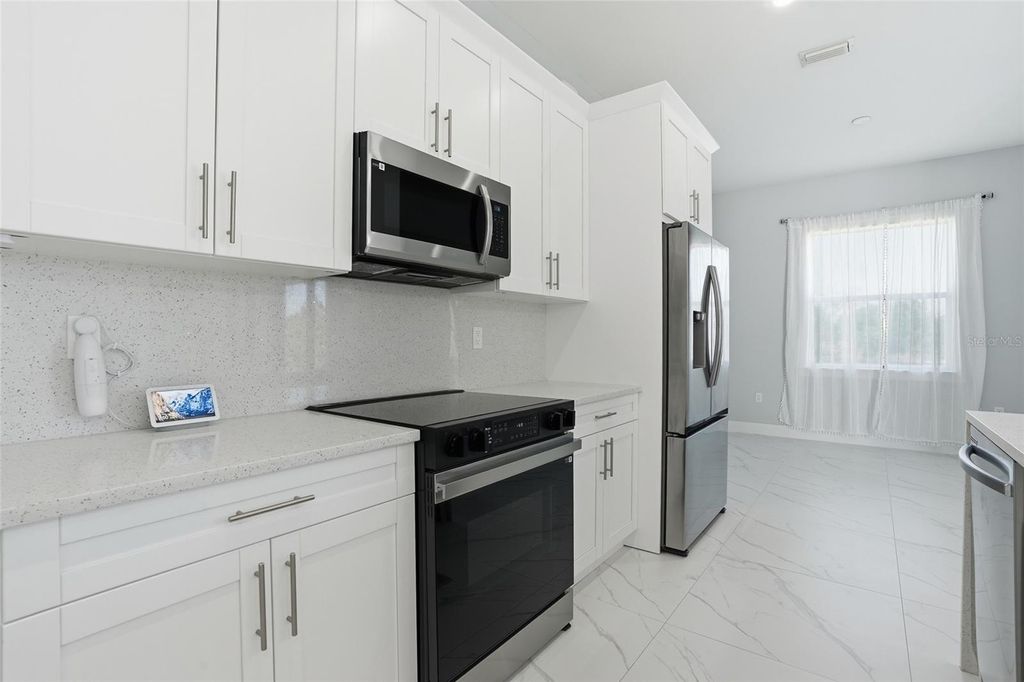 Image 7 of property listing at 2415 56TH AVENUE NE, Naples, FL 34120