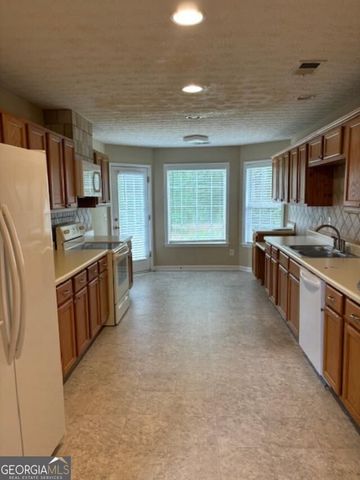 791 Winding Grove Lane, Loganville, GA 30052