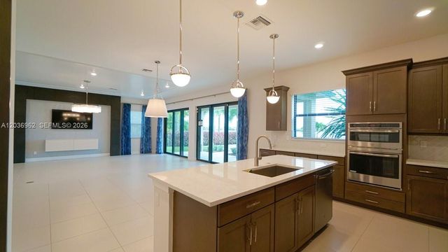 8725 Parkland Bay Drive, Parkland, FL 33076