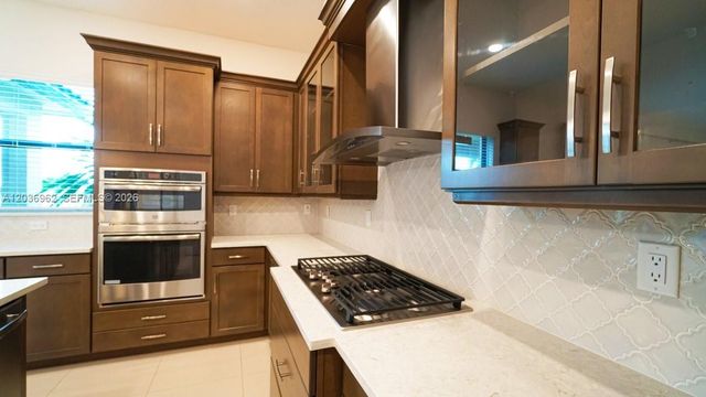 8725 Parkland Bay Drive, Parkland, FL 33076