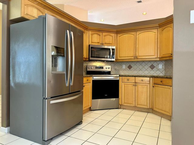 386 Carrington Drive, Weston, FL 33326