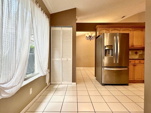 386 Carrington Drive, Weston, FL 33326