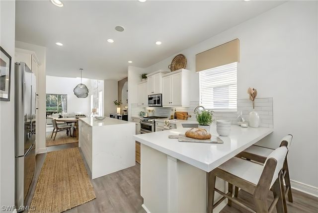 9266 Troon Lakes DR, Naples, FL 34109