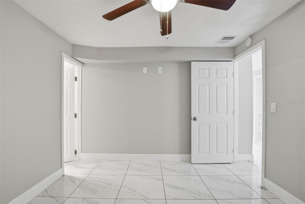 Image 13 of property listing at 6033 W AMELIA STREET, Orlando, FL 32835