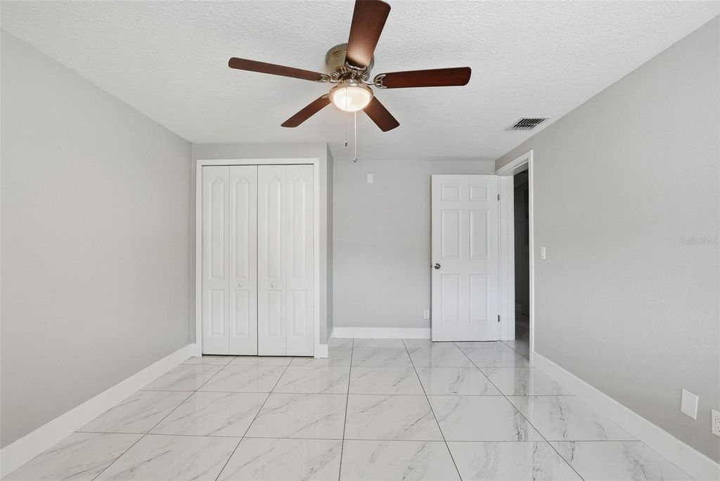 Image 20 of property listing at 6033 W AMELIA STREET, Orlando, FL 32835