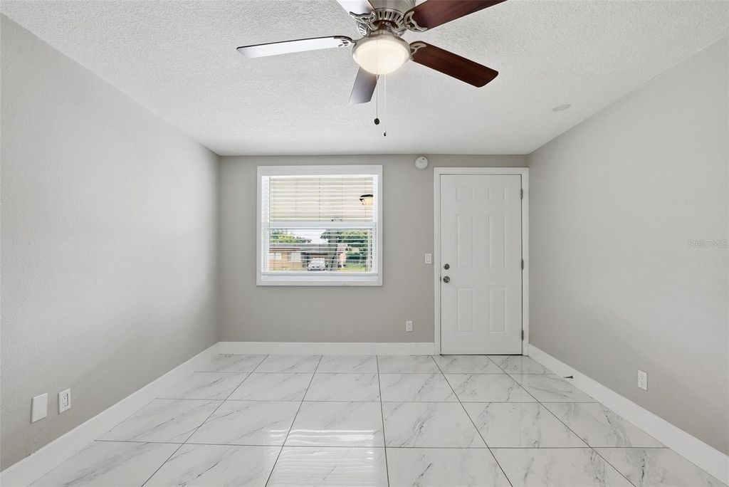 Image 4 of property listing at 6033 W AMELIA STREET, Orlando, FL 32835