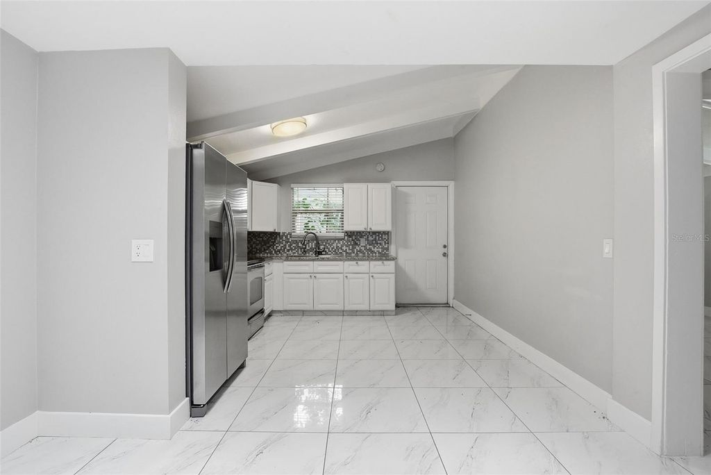 Image 6 of property listing at 6033 W AMELIA STREET, Orlando, FL 32835